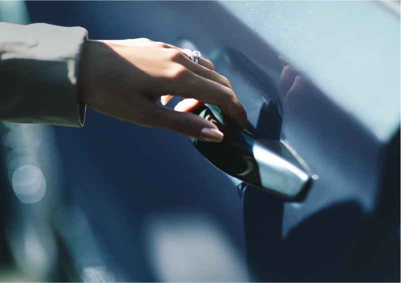 A hand gracefully grips the Light Touch Handle of a 2023 Lincoln Aviator® SUV to demonstrate its ease of use | Sheehy Lincoln of Richmond in Richmond VA