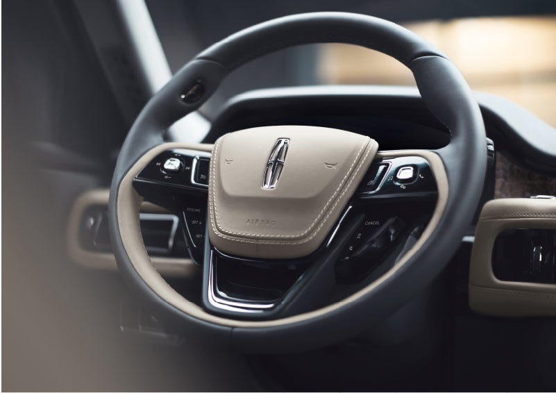 The intuitively placed controls of the steering wheel on a 2023 Lincoln Aviator® SUV | Sheehy Lincoln of Richmond in Richmond VA